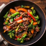 Homemade beef chop suey with vegetables in a bowl